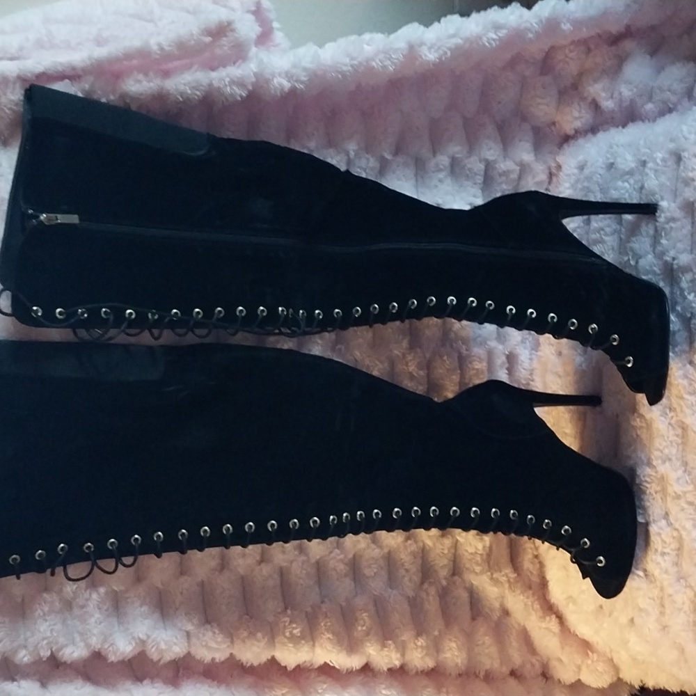 Dollhouse Black Over the Knee Lace-Up Boots with gold tone accents.